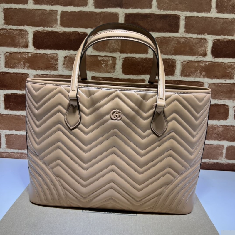 G*u*i shopping bags